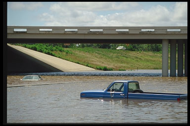 Truck Partially Submerged by Flooding